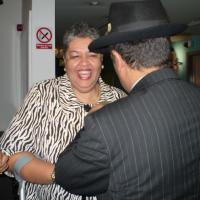 Jamaican High Commissioner receiving her WAWI Pin Badge 